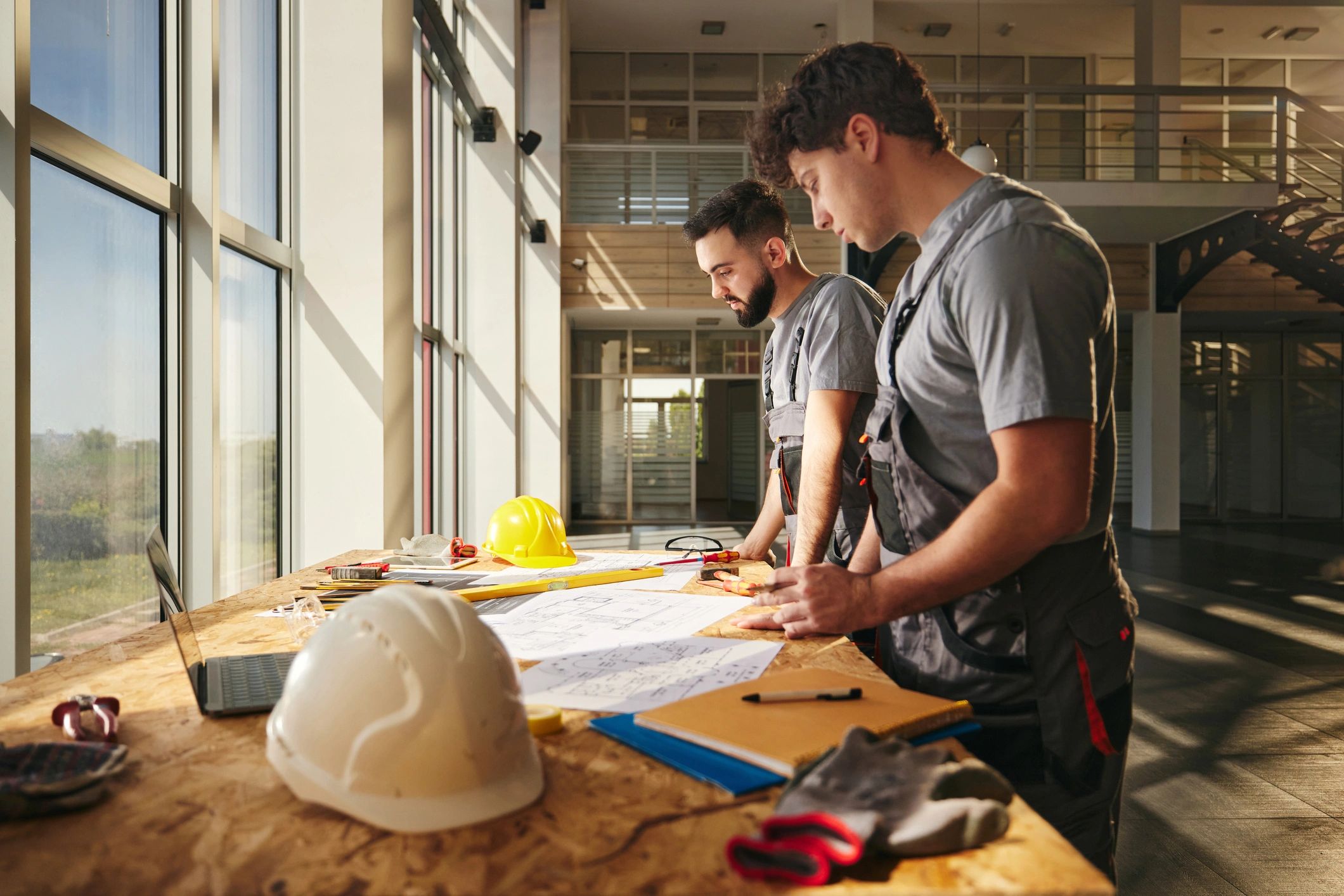 Construction professionals reviewing plans together